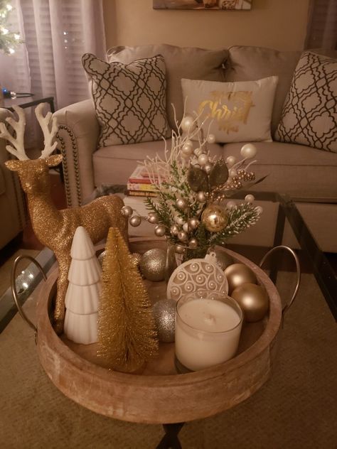 My decorations mainly is silver and gold with some white items! Half Moon Table Christmas Decor, Coffee Table Centerpieces Christmas, Side Table Decor Christmas, Christmas Decor For Living Room Table, Christmas Centerpiece For Coffee Table, Center Table Living Room Christmas Decor, Coffee Table Decor Winter, Christmas Decor On Coffee Table, Christmas Round Dining Table Decor