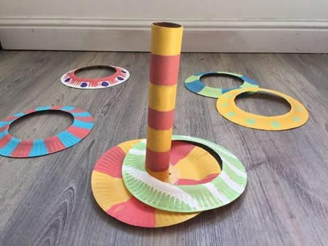 25 Paper Plate Activities and Craft Projects to Try | WeAreTeachers Homemade Rings, Plate Crafts For Kids, Paper Plate Crafts For Kids, Ring Toss Game, Ring Toss, Paper Plate Crafts, Plate Crafts, Crafts For Kids To Make, Fun Crafts For Kids