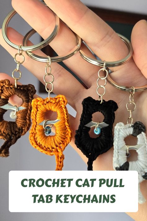 Handmade crochet kitty keychains! *these are physical items* These crochet keychains add the cutest kitty to your everyday! For special bead colour requests, see personalization :) #CrochetProjects Crochet Cat Pull Tab Keychains, Crochet Can Tabs Free Pattern, Crochet Key Fob Pattern, Pull Tab Crochet Patterns, Crochet Guitar Keychain, Poptab Crochet, Crochet Id Holder, Crochet Wristlet Keychain Pattern Free, Crochet Cat Keychain Pattern Free