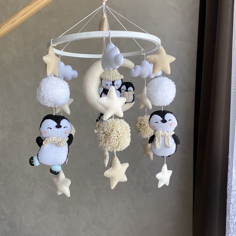 Hanging penguins baby mobile for the newborn.Penguin baby mobile is ideal for decorating your contemporary neutral baby nursery and the best present for your new child or for a baby shower. Mobile inclouds five differents penguins, three clouds, seven little stars and seven big stars, six pompons and other. The size. The diameter of the ring is 22 cm. Full length ~ 40-45 cm. Materials Ring, Hypoallergenic felt Hypoallergenic holofiber filler. Care. Dry or steam cleaning. Our mobiles are for deco Penguin Nursery Theme, Penguin Nursery, Neutral Baby Nursery, Brownstone Homes, Penguin Baby, Gorgeous Animals, Mobile Crib, Baby Nursery Neutral, Mobile Baby