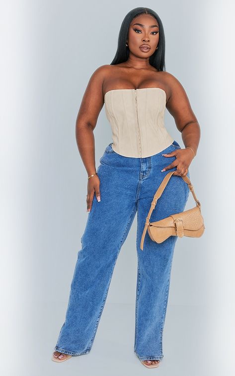 Get ready to look all kinds of chic in this plus cream washed faux leather hook and eye structured corset. Brought to you in a cream hue washed faux leather material with a hook and eye design and a flattering structured corset fit, how can you not fall in love? Style this plus corset with jeans, heels and a mini bag for a look that is sure to nail the 'jeans and a nice top' dress code. Length approx 33cm/13inch (Based on a sample size UK 16) Model wears size UK 16/ EU 44/ AUS 16/ US 12Model Height - 5ft 6inchp]:!mb-0inch>Category: TopsProduct type: CorsetColour: CreamDesign: PlainNeckline: BandeauSleeves: SleevelessOccasion: Evening Corset With Jeans, Plus Size Clothing Uk, Structured Corset, Jeans Heels, Corset Outfit, Mom Jeans Outfit, 17th Birthday, Going Out Tops, Hook And Eye