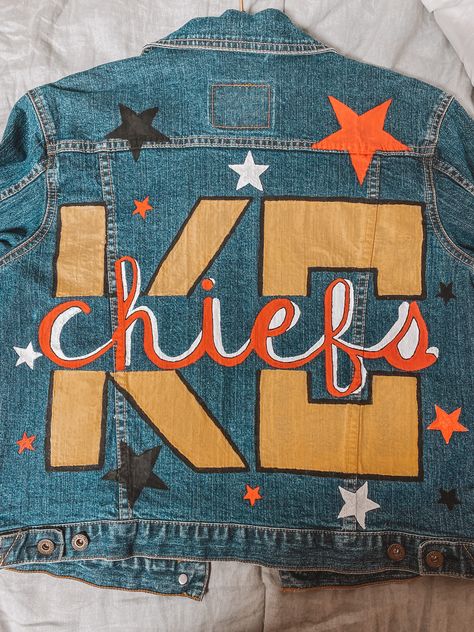 kc chiefs painted jean denim jacket Sports Team Jean Jacket Diy, College Denim Jacket Diy, Painted Jean Jacket Lsu, Painted Denim Jacket School Spirit, Painted College Jean Jacket, Painted Denim Jacket Football, Football Jean Jacket Diy, Jean Jacket Painted Football, College Jean Jacket Diy