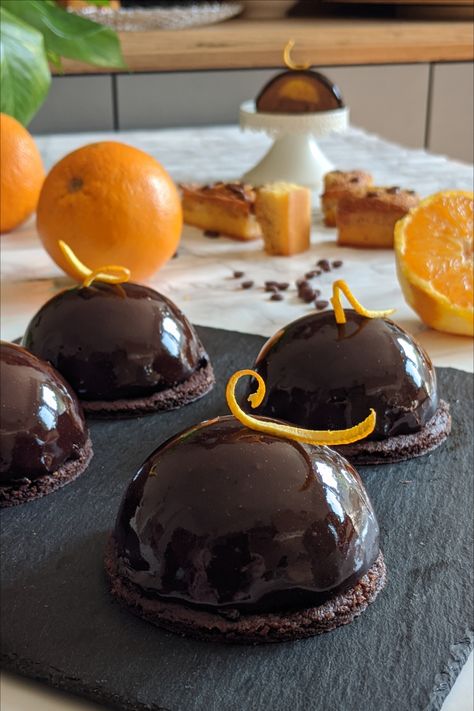 Domed Desserts, Chocolate Entremet Recipe, Chocolate Dome Cake, Fancy Chocolate Desserts, Dome Desserts, Orange Chocolate Desserts, Dome Dessert, Mousse Dome Recipe, Dome Cake