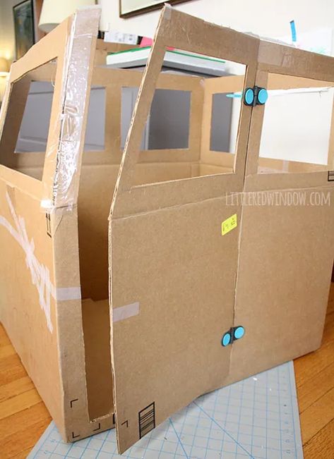 How To Make A Car Out Of Cardboard, Making A Car Out Of Cardboard, Diy Cardboard Truck, Cardboard Bus, Golf Cart Decorations, Cardboard Box Car, Large Cardboard Boxes, Cardboard Playhouse, Cardboard Cat House