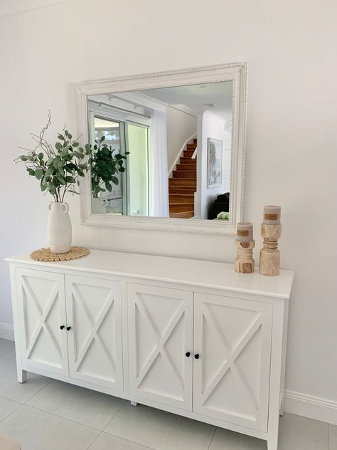 Buffet And Mirror, Hallway Buffet Decor, Hamptons Buffet Styling, Hamptons Style Entryway, Hampton Entryway, Buffet With Mirror Above, Coastal Hamptons Style Living Rooms, Hamptons Buffet, Modern Beach Apartment