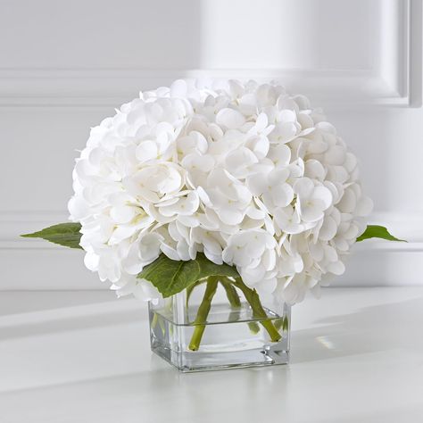 PRICES MAY VARY. 🌹【Refined Square Vase with Imitation Water】: Presenting an 8.3-inch tall floral masterpiece, featuring a 4-inch high square glass vase with sides measuring 3.5 inches across, contained with crystal-clear imitation water. This visually appealing base perfectly complements the four lush hydrangea blossoms, infusing your space with a touch of understated elegance. 💐【Lifelike PU Hydrangeas】: Handcrafted from premium PU material, our expertly designed hydrangeas mimic nature’s beau