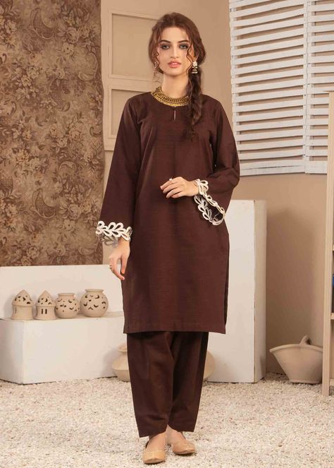 Include: Shirt Trouser Fabric: Khaddar Color: Black Description: Chocolate- we present you the most versatile piece of clothing you can own in your wardrobe with such adorable colour shade of brown to please your fashion dreams. This Two-piece dress comes with a trendy round neckline and our best-of-all sleeves embroidered design which is there to keep you in line with updated fashion. The fabrication of khadder is used exclusively for winters in this dress. This is 2 Piece Stitched outfit.Discl Brown Color Dress Pakistani, 2 Piece Dress Design Pakistani, Brown Colour Dress, Eid Suits, Trouser Designs Pakistani, Dress Design Pakistani, Boutique Suit, Bts Bag, Colour Aesthetic