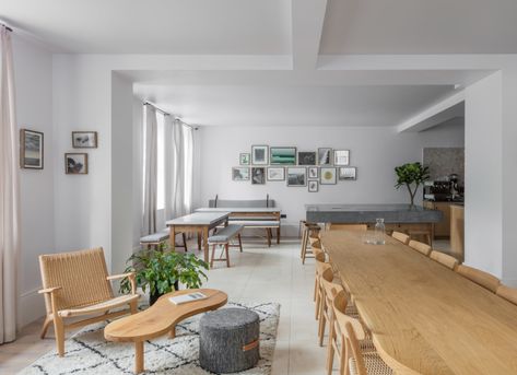 Holland Harvey revamps Georgian townhouses to form Inhabit hotel 12 Seater Dining Table, Blue Bookshelves, Timber Frame Joinery, Classic Dining Table, Small Lounge, Georgian Townhouse, Green Velvet Sofa, Exposed Brick Walls, Hotel Interiors