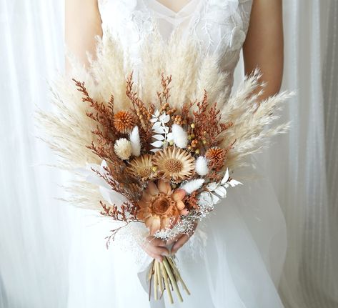 PRICES MAY VARY. dried flowers, wedding bouquet,dried flower bouquet,rustic wedding,wedding decor,wedding flowers,bridal bouquet,bridesmaids flowers, This pretty bouquet is accented with gorgeous dried flowers, preserved flowers and silk flowers. It is perfect for an outdoor or woodland-themed wedding. It could be used on the weddings,and also could be used as home decoration,even as a gift for the bridesmaid. Very useful. Size: made to order Natural Wedding Flowers, Wedding Dress Topper, Grass Bouquet, Pampas Grass Bouquet, Boho Wedding Bouquet, Prettiest Bouquet, Grass Wedding, Pampas Gras, Dry Flower