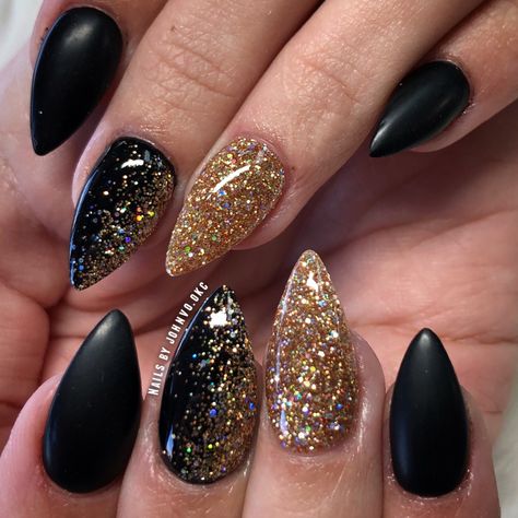 Black Gold And Silver Acrylic Nails, New Years Eve Almond Nails, Black And Gold Dipped Nails, Black Gold Sparkle Nails, 3 Color Dip Powder Nails, Black Gold Almond Nails, Black And Gold Dip Powder Nails, Black And Gold Nye Nails, New Year’s Eve Nails Design Black