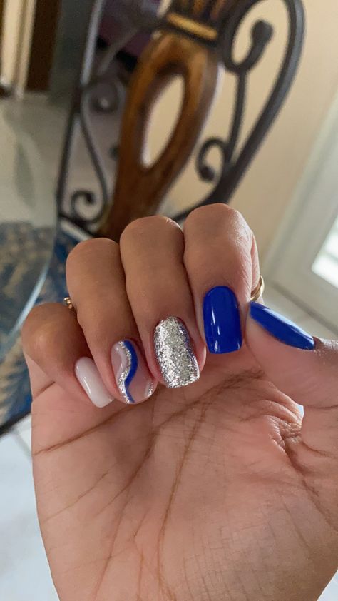 Blue Prom Nails Acrylic Short, Royal Blue Gel Manicure, Blue Design Nails Short, Royal Blue Nails With White Design, Hoco Nails Blue And Silver, Blue Nails Prom Short, Blue Homecoming Nails Acrylic, Royal Blue Accent Nails, Acrylic Nails For Navy Blue Prom Dress