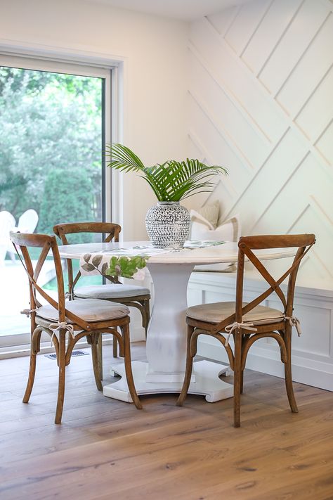 Love this accent wall in the Dining room of this recent remodel done by White House Designs.  www.instagram.com/whitehousedesigns.ca Accent Wall Kitchen Nook, Kitchen Nook Accent Wall, Small Dining Room Accent Wall, Accent Wall White, Panelled Hallway, White Accent Wall, Accent Wall Kitchen, Trim Wall, Dining Room Accent Wall