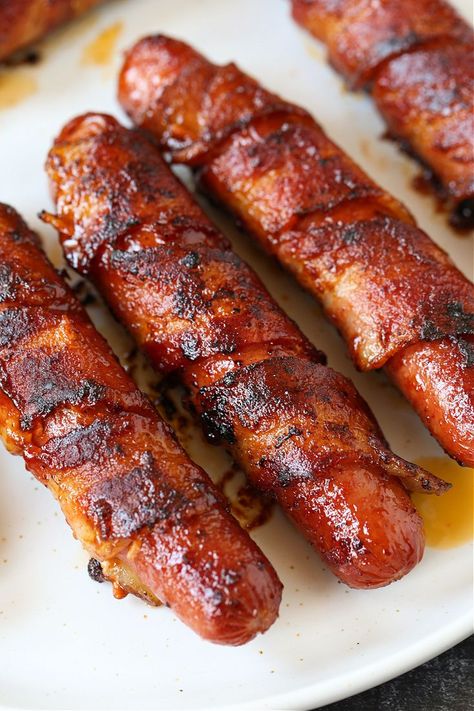 These Bacon Wrapped Hot Dogs are the ultimate hot dog recipe! Super crispy bacon with a snap from the hot dog, coated with a sweet and spicy glaze! Hotdogs With Bacon, Texas Tommy Hot Dogs, Hot Dog Marinade Recipes, Bacon Wrapped Hot Dogs Grilled, Bacon Hotdogs Recipes, Grilled Hotdogs Recipes, Jumbo Hot Dogs, Hot Dogs With Bacon, Bacon For Dinner Meals