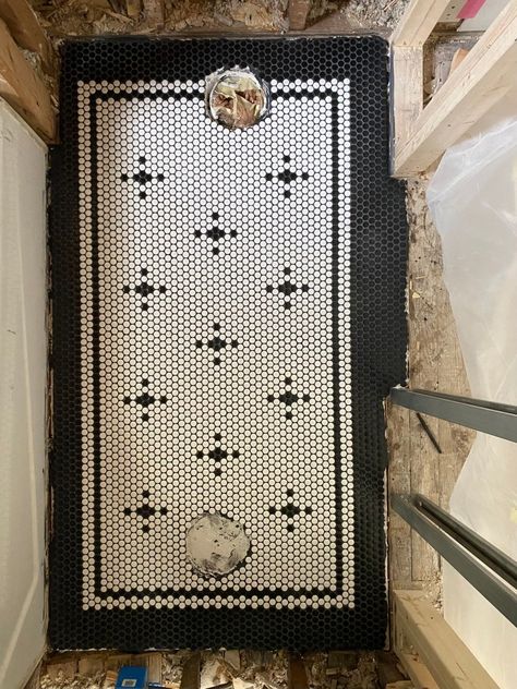 DIY Vintage-Inspired Patterned Penny Tile Bathroom Floor Bathroom Floor Tile Vintage, Vintage Hex Tile Bathroom, Penny Tiles Shower Floor, Powder Room Penny Tile, Black Penny Tile Fireplace Surround, Marble Look Tile Bathroom Floor, Penny Tile Words Bathroom, Penny Tile Half Bath, Penny Tile Vestibule