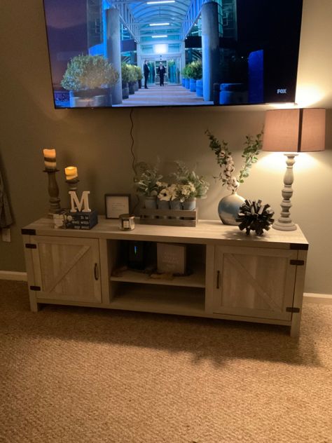 Decorating Idea For Tv Stand, Entertainment Table Decor, Living Room Ideas With Mounted Tv, Farmhouse Living Room Tv Stand Decor, Tv Stand Decor Under Mounted Tv, Living Room Around Tv Decor, Apartment Living Room Mounted Tv, Decorating Top Of Tv Stand, Top Of Tv Stand Decor