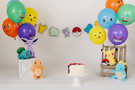 Pokemon Themed Cake Smash Pokemon Birthday Theme Ideas, Pokemon Birthday Photoshoot, First Birthday Pokemon Theme, Pokemon Smash Cake, Pokemon First Birthday, Pokemon Themed Cake, Pokemon Photoshoot, Pokemon Party Decorations, Themed Cake Smash