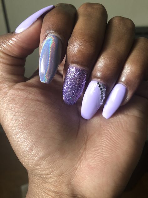 Lavender Purple Nails🦄 , 1 Gel glitter polish, one lavender w/holographic over top, and three nails with just Lavender purple gel polish (one w/tiny diamonds) . 💜💅🏽 Nails With Feature Nail, Purple Nails With Diamonds, Lavender Purple Nails, Glitter Nail Art Designs, Purple Gel Polish, Feature Nail, Nail Pics, Glitter Polish, Diamond Nails