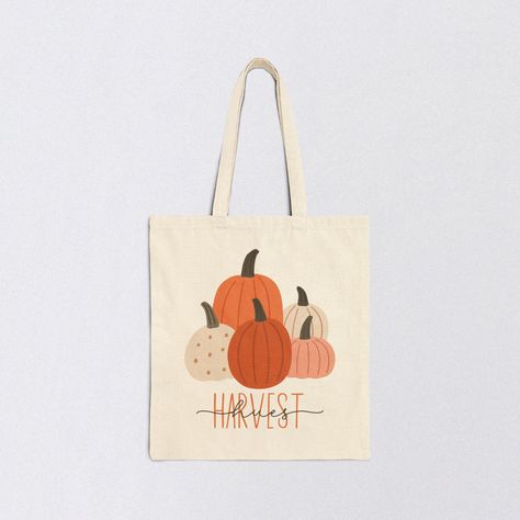 Dive into Fall with this cute Canvas Tote adorned with farmhouse-style pumpkins.  Great for the Farmer's Market, Library, and many other errands you run this autumn.  Makes a great gift bag for fall birthdays, and a fun party favor for autumn bridal showers. CUSTOMIZATION ▸If you would like to add a name or other personalization to this tote, simply indicate the wording you would like to add in the optional Personalization box when ordering. ▸I'll send you a proof of any customizations prior to Fall Tote Bags Diy, Painting Canvas Bags, Autumn Tote Bag, Fall Tote Bag, Autumn Bridal, Fall Tote, Christmas Tote Bags, Fall Bridal Shower, Christmas Tote