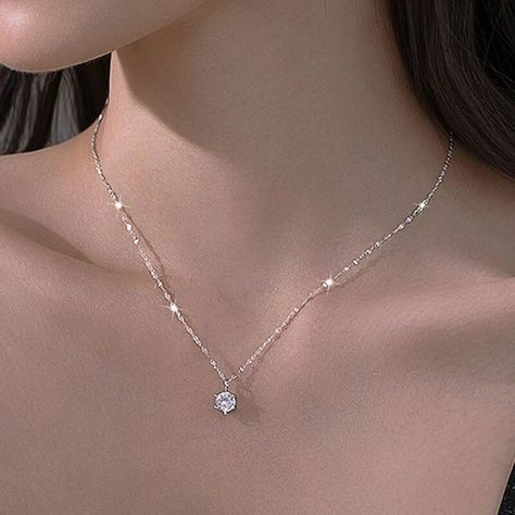 Discover the epitome of elegance and style with our New Trendy 925 Sterling Silver AAA Zircon Choker Necklace Collection. Crafted with meticulous attention to detail, these stunning necklaces exude a timeless charm that will captivate any woman's heart. Each necklace features a radiant AAA Zircon, a brilliant alternative to diamonds, exuding a dazzling shine that captures and reflects light from every angle. The 925 Sterling Silver chain adds a touch of sophistication, ensuring durability and a lasting shine. The minimalistic design of these choker necklaces embodies simplicity and versatility, making them perfect for any occasion. Whether worn solo for a subtle touch of glamour or layered with other necklaces for a trendy stacked look, these pieces effortlessly elevate any outfit. The CZ Engagement Necklaces, Sterling Silver Choker, Silver Choker Necklace, Round Pendant Necklace, Classic Necklace, Silver Choker, Cz Pendant, Copper Pendants, Fine Jewelry Gift