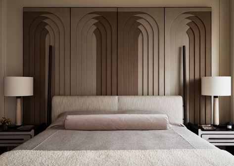 This elegant four-poster bed’s tapered wood frame gives it a stately sense of verticality, drawing attention upward without extending the headboard itself. Lucia’s slim wooden legs- designed to create lightness even when placed in the center of the room - are connected to the upholstered base by metal cuffs. Bedroom Tiles Design, Modern Bedroom Interior Design Ideas, Bedroom Tiles, Ideas Bedroom Decoration, Bedroom Interior Design Ideas, Bed Back Design, Luxury Closets, Closets Design, Modern Luxury Bedroom