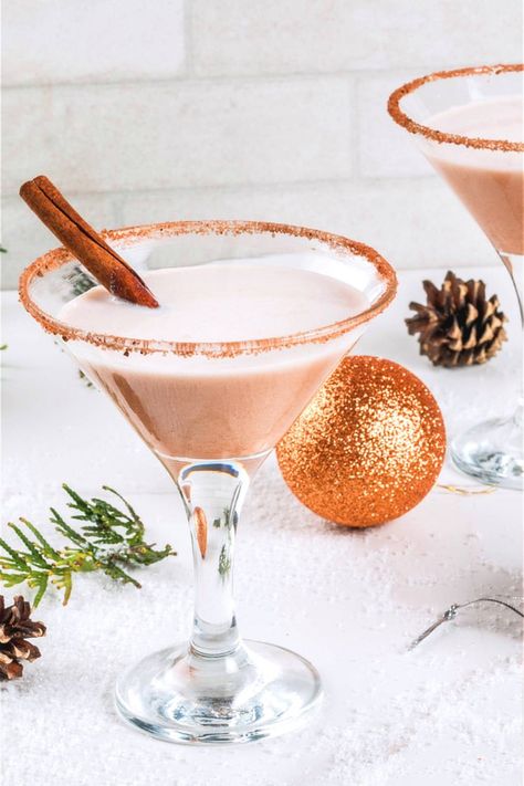 The Eggnog Martini recipe takes ordinary eggnog and mixes it with vanilla vodka, amaretto and more. The result is a lighter version of eggnog with a wonderful flavor. Boozy Christmas Drinks, Eggnog Martini Recipe, Christmas Cocktails Vodka, Eggnog Martini, Festive Cocktail Recipes, Eggnog Cocktail, Christmas Drinks Alcohol Recipes, Christmas Eggnog, Christmas Drinks Alcohol