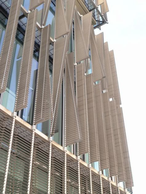 Smart shading systems promote sustainability and enhance the building performances. Sun Shading Architecture, Kinetic Architecture, Shading Device, Fall Carnival, Build Character, Cladding Design, Smart Building, Service Area, Metal Facade