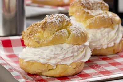 Cream Puffs | MrFood.com State Fair Cream Puffs, Easy Cream Puffs, Cream Puffs Easy, Mr Food, State Fair Food, Cream Puff Recipe, Carnival Food, Stick Butter, Puff Recipe