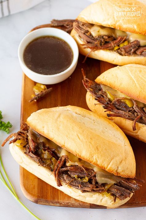 This Italian Beef Sandwich is tender and full of flavor. Tender beef, slow cooked in savory juices paired with spicy fixings make a savory melt in your mouth meal! Side Dishes For A Crowd, Dishes For A Crowd, Instant Pot French Dip, French Dip Recipes, Slow Cooker Bbq Beef, Oven Baked French Fries, French Dip Crock Pot, Bbq Beef Sandwiches, Chicken French