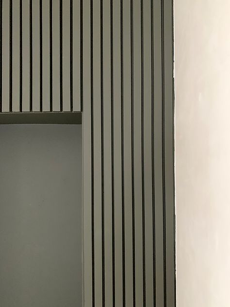 Painted Wood Slats On Wall, Green Slat Wall Bedroom, Basement Slat Wall, Slat Panelling Hallway, Wood Slat Wall With Window, Green Wood Slat Wall, Painted Wood Slat Wall, Dark Green Slat Wall, Mdf Slat Wall