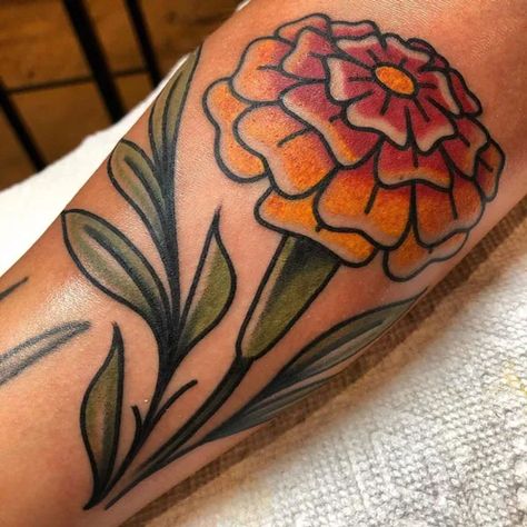 Marigold Mandala Tattoo, Marigold Elbow Tattoo, Cosmos Flower Tattoo Traditional, American Traditional Monstera, Neo Traditional Marigold Tattoo, American Traditional Marigold Tattoo, Marigold Tattoo Traditional, Marigold Traditional Tattoo, Traditional Marigold Tattoo