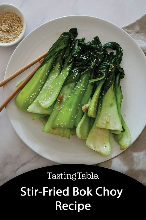 Step up your side dish game by skipping the broccoli or salad and giving this easy stir-fried bok choy recipe a try. Bonus: It takes just 10 minutes to make. #vegetarian #recipe #dinner #stirfry Vietnamese Veggie Recipes, Book Choy, Choy Recipes, Easy Vietnamese Recipes, Vietnamese Foods, Wok Recipes, Veggie Recipe, Garlic Recipe, Viet Food