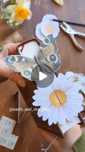 🌿Anna☀️| Crafts, Play & Learning on Instagram: "Springtime 3D bookmarks 🦋 - template available 🌼  This week we're celebrating all things butterfly and flower (ok, so not much change there with the last one) 😅 now that Spring is slowly pushing through!  Turn your books into a lovely spring garden with a collection of butterflies &  flower paper crafts! I absolutely loved making these! And they're so easy to make! I would love to make my own watercolour series but that's a project for another time 🦋  My daughter got crafting this weekend and made a bunch for her new books!  All you need is some paper, glue dots (ours are from @bostikuk ) and some scissors!  - I've made a template for you guys if you'd like to make these yourself! Let me know if you'd like a copy! -  #butterflycraft #but Flower Paper Crafts, 3d Bookmarks, Anna Craft, Butterfly Books, Bookmark Craft, Bookmark Template, Flower Paper, Flower Bookmark, Paper Glue