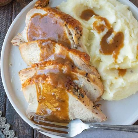 Turkey gravy poured on top of turkey on a white plate with mashed potatoes. Make Ahead Turkey Gravy Recipe, Make Ahead Turkey, Roasting Turkey, Turkey Gravy Recipe Easy, Make Ahead Turkey Gravy, Homemade Turkey Gravy, Making Turkey Gravy, The Perfect Turkey, Turkey Gravy Recipe