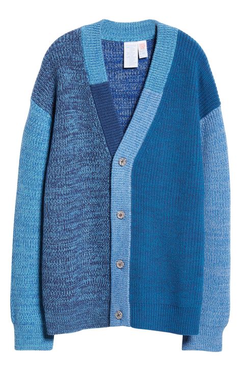 Hand-knit using surplus and scrap yarns, this cardigan crafted with soft wool features tonal colorblocking and a true one-of-a-kind look. Front button closure Ribbed cuffs and hem Blue cardigan is 73% wool, 17% viscose, 7% nylon, 3% cashmere; white cardigan is 54% wool, 20% viscose, 8% nylon, 6% acrylic, 4% polyester, 3% cashmere, 3% linen, 2% mohair Hand wash, dry flat Imported Designer Clothing Due to the handmade nature and the use of different combinations of leftover yarns, each truly one-a Unique Knitwear, Yarn Project, Dishcloth Knitting Patterns, Yarn Sweater, Blue Cardigan, Yarn Projects, Knitwear Men, White Cardigan, Knitwear Design