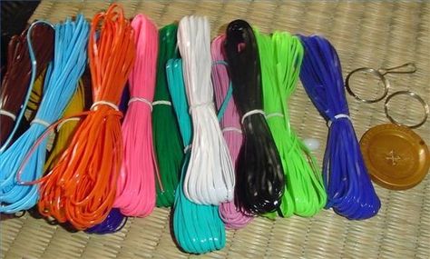 Plastic lacing for craft projects has different names, such as Rexlace, gimp and even boondoggle, depending on the manufacturer. No matter what you call it, it is a great craft material for making keychains and bracelets. Plastic Lace Crafts, Gimp Bracelets, Slumber Party Activities, Bracelets Kandi, Making Keychains, Diy Lanyard, Plastic Lace, Pokemon Bead, Beaded Lampshade