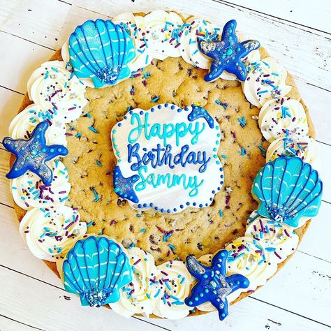 Mermaid Cookie Cake, Beach Cookie Cake, Oneder The Sea 1st Birthday Cookies, Under The Sea Cheesecake, Let’s Shellebrate Birthday, Beach Theme Cookie Cake, Sea Shell Cake Idea, Seashell Cookies, Beach Theme Birthday