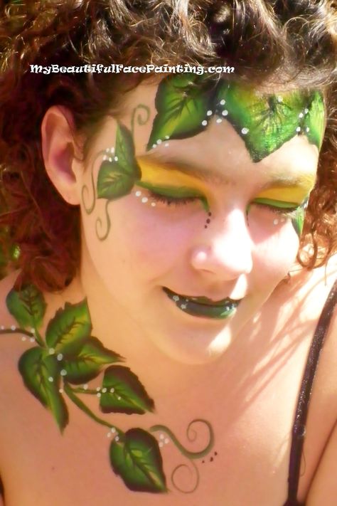 Poison Ivy face paint. Yellow background-Starblend powder. Leaves and lips-Tag small leaf split.  Outline-DFX black. White dots-DFX. Poison Ivy Face Paint, Plant Face Paint, Vine Face Paint, Ivy Face Paint, Leaves Face Paint, Leaf Face Paint, Leaf Makeup, Green Face Paint, Fairy Face Paint