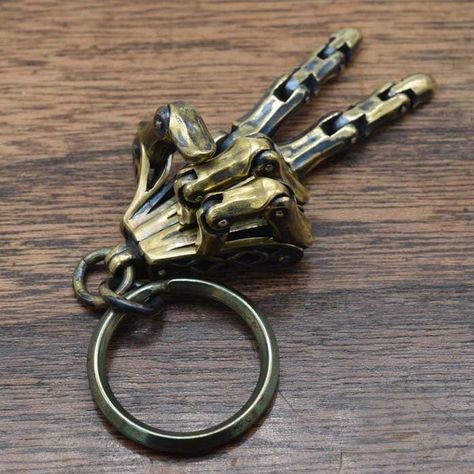 "\"LEFT HAND keyring\"  The hand closest to the heart.  It is movable with five fingers, but cannot be fixed with a hand sign.  This keyring is made in Japan.  Height⇒55㎜(2.16in) Ｗidth⇒55㎜  Weight⇒34g  Material⇒Brass  ※This item may take more than 20 days to ship." Jewelry Smithing, Chain Pants, Pocket Tools, Mecha Design, Film Ideas, Steampunk Aesthetic, Paracord Diy, Pant Chains, Hand Sign