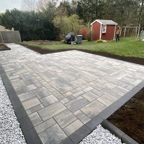 Check out this unique beauty of a patio we completed today in Manchester, CT - 450sq ft patio using Techo-bloc Blu Smooth HD Shale grey, an inlay table area of Blu Grande Smooth with a Valet champlain grey border and onyx black Blu smooth for the exterior border. All in all a very unique and awesome patio project! Backyard Entertainment, Driveway Pavers, Unique Patios, Paver Patios, Pool Pavers, Inlay Table, Shale Grey, Paver Designs, Concrete Patio Designs