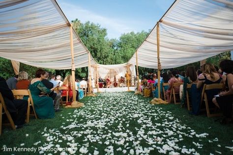 Loving the shade for outdoor guests and the modern mandap at this fusion wedding.    |Fusion wedding | Indian wedding | Indian wedding decor | mandaps Outdoor Wedding Ceremony Shade, Wedding Ceremony Shade Ideas, Outdoor Wedding Shade Ideas, Modern Mandap, Yosemite Wedding, Mandap Decor, Tent Decorations, Wedding Mandap, Outdoor Indian Wedding