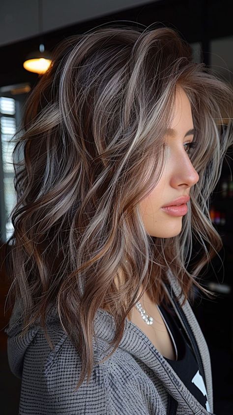 25 Silver Hair Color Ideas for an Easy, Chic Look Brown Hair With Silver Highlights, Rambut Brunette, Grey Hair Transformation, Kadeřnické Trendy, Grey Hair Inspiration, Brunette Hair With Highlights, Dark Hair With Highlights, Silver Hair Color, Caramel Highlights