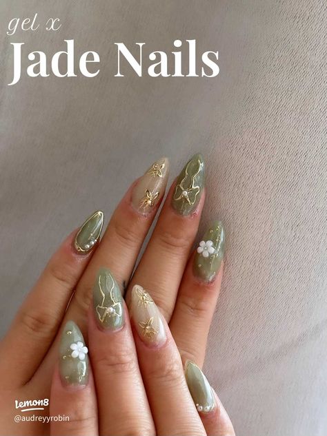 jade nails💚🤍 | Gallery posted by AUD | Lemon8 Nails Flower Simple, Sage Green Nails Inspiration, Cute Subtle Nail Designs, Jade Nails Designs Almond, Sage Green Nails With Charms, Jade Nails Gel, Jade Almond Acrylic Nails, Cute Almond Nails Green, Gold Brown Nails Design