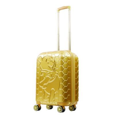 Are you ready to embark on a whimsical journey with Disney's Winnie the Pooh ? Our Disney Winnie the Pooh Molded Suitcase Spinner is here to make your travel dreams come true. -Made with durable ABS and polycarbonate film for extra protection against the elements. Exterior 90% ABS 10% PC film, Interior Polyester. -Gentle, 360 degree movement on 8 spinner wheels. -Dependable telescopic pull handle provides hassle-free transportation. -Compression straps help you pack more items and prevent contents from spilling. -Zip wet dry compartment for personal essentials and 2 mesh zip pockets for small accessories. -Sizeable polyester-lined main compartment is divided for easy organizing. -Expandable for more space with a 2 inch zipper gusset. -Retractable top carry handle for loading into trunks, c Film Interior, Hard Sided Luggage, Hardside Spinner Luggage, Spinner Suitcase, Spinner Luggage, Honeycomb Design, Carry On Suitcase, Disney Shop, Pooh Bear