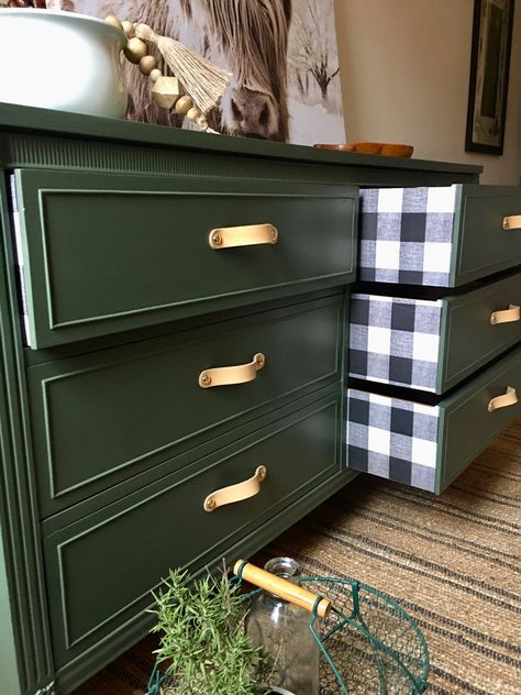 Olive green refinished dresser with buffalo check pattern on drawer sides. Reminds me of cabin with wood stoves nestled in a spruce tree forest. Dark Green Refurbished Dresser, Green Upcycled Dresser, Dark Green Dresser Diy, Green Refinished Furniture, Green Dressers Bedroom, Green Dresser With Wood Drawers, Hunter Green Dresser Diy, Farmhouse Green Dresser, Green Dresser With Wood Top