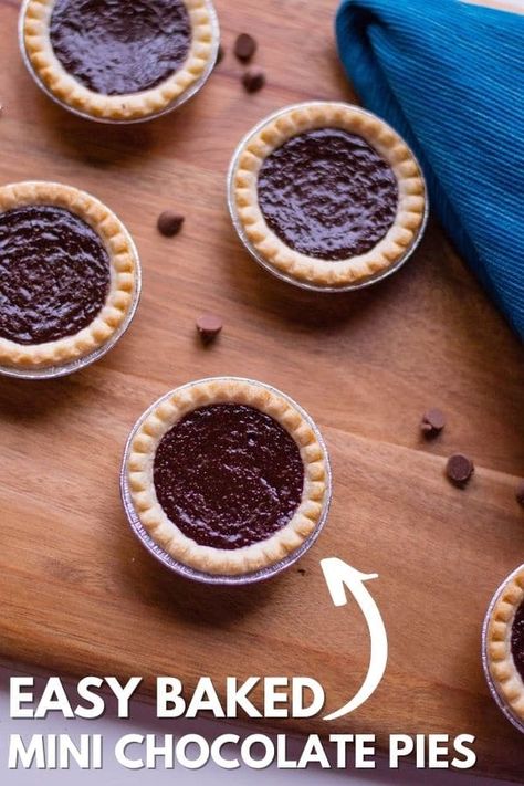 Mini Chocolate Pies are a baked chocolate pie that is in a buttery crust. The perfect homemade pie recipe to serve up for any occasion. Grab your mini pie crusts and make a homemade chocolate pie filling to pour in and bake. #party #food #dessert #homemade #chocolate #pie #baked #mini #singleserve #holiday #pierecipe Chocolate Pie Baked, Mini Fudge Pies, Recipes Using Mini Pie Shells, Mini Chocolate Chess Pies, Recipes With Mini Pie Crust, Chocolate Mini Pies, Mini Pie Crust Recipe Easy, Mini Chocolate Pies In Muffin Tin, Mini Pie Crust Desserts