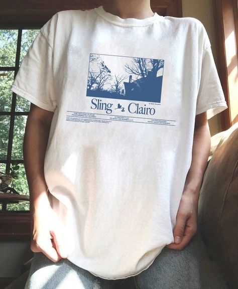 . A must-have for any Y2K fan! This shirt is inspired by Clairo's iconic style. #Y2K #Clairo . #Clairo_Sling #Cute_Merch #Merch_Inspiration #Merch_Aesthetic Tshirt Merch Design, Clairo Merch, Clairo Sling, Cute Merch, Merch Inspiration, Tshirt Inspiration, Merch Shirt, Y2k Shirt, Merch Ideas