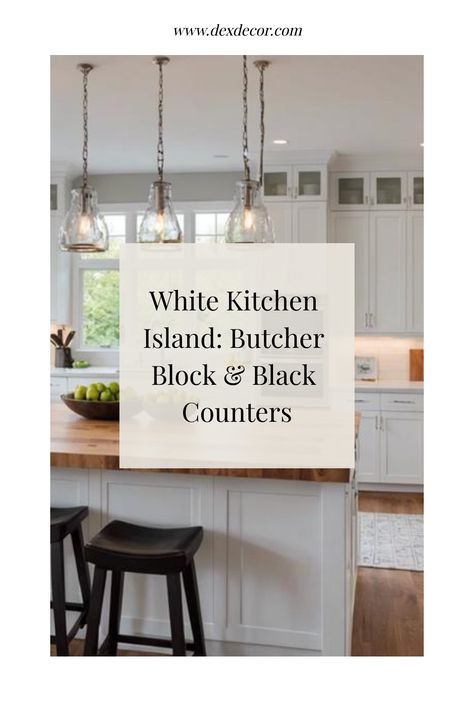 White kitchen with a butcher block island, black countertops, and hanging glass light fixtures. White Island With Butcher Block Top, Black Island With Butcher Block, Black Butcher Block Countertops, White Kitchen Black Accents, White Kitchen Black Countertops, White Kitchen With Butcher Block Island, White Cabinets Black Island, Dream White Kitchen, Kitchen Island Butcher Block