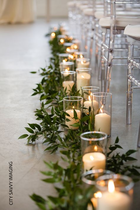 Greenery And Candle Aisle Decor, Candles Ceremony Aisle, Floral Wedding Arch With Lights, Isle Candles Wedding, Wedding Aisle With Candles And Flowers, Wedding Ceremony Floor Decor, Wedding Flower Arrangements For Isle, Aisle Candle Decorations Wedding, Wedding Aisle Greenery And Candles