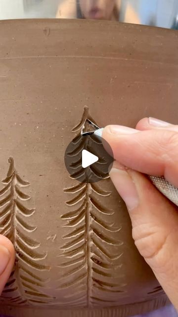 Bethany Hensley on Instagram: "Carving pine trees on a Milky Way Pines Serving Bowl  ✨🌲🌙🌲✨" Pine Tree Pottery, Pottery Christmas Trees Diy, Clay Pine Tree, How To Carve Pottery, Pottery Carving Designs, Clay Carving Ideas, Ceramics Christmas Ideas, Pottery Patterns Ideas, Pottery Slab Ideas