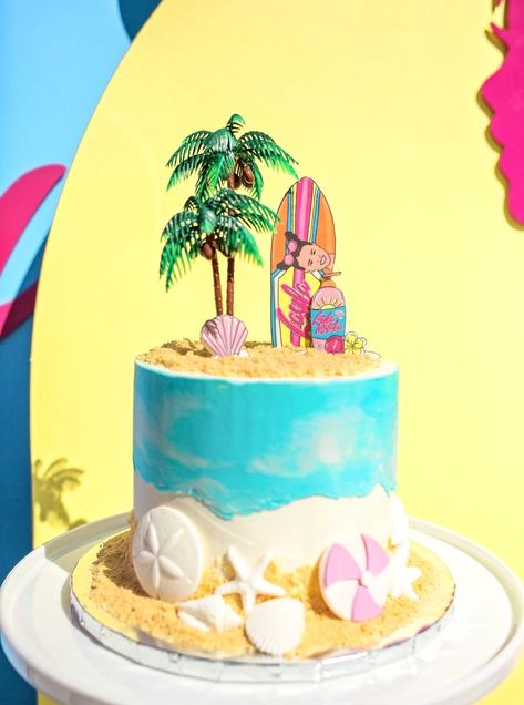 Malibu beach barbie cake, beach cake, beach cake inspiration, White and blue cake with graham cracker sand and beach accents. Sand dollar, starfish, and beach ball fondant accents. Palm tree and surfboard topper, scottsdale arizona Barbie Beach Cake, Barbie 4th Birthday Party, Malibu Barbie Cake, Barbie 4th Birthday, Surfer Cake, Palm Tree Cakes, Beach Birthday Cake, Barbie Pool, Anna Birthday Party